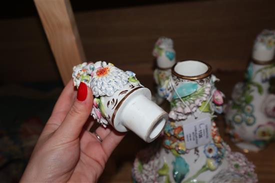 Three English porcelain flower encrusted scent bottles and covers, c. 1830-40, possibly Coalbrookdale, H. 41cm and 28cm